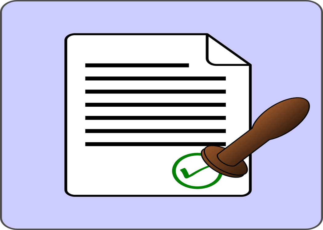 image of paper being stamped and certified